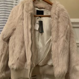 NWT Banana Republic sand colored size small faux fur bomber jacket. Never worn